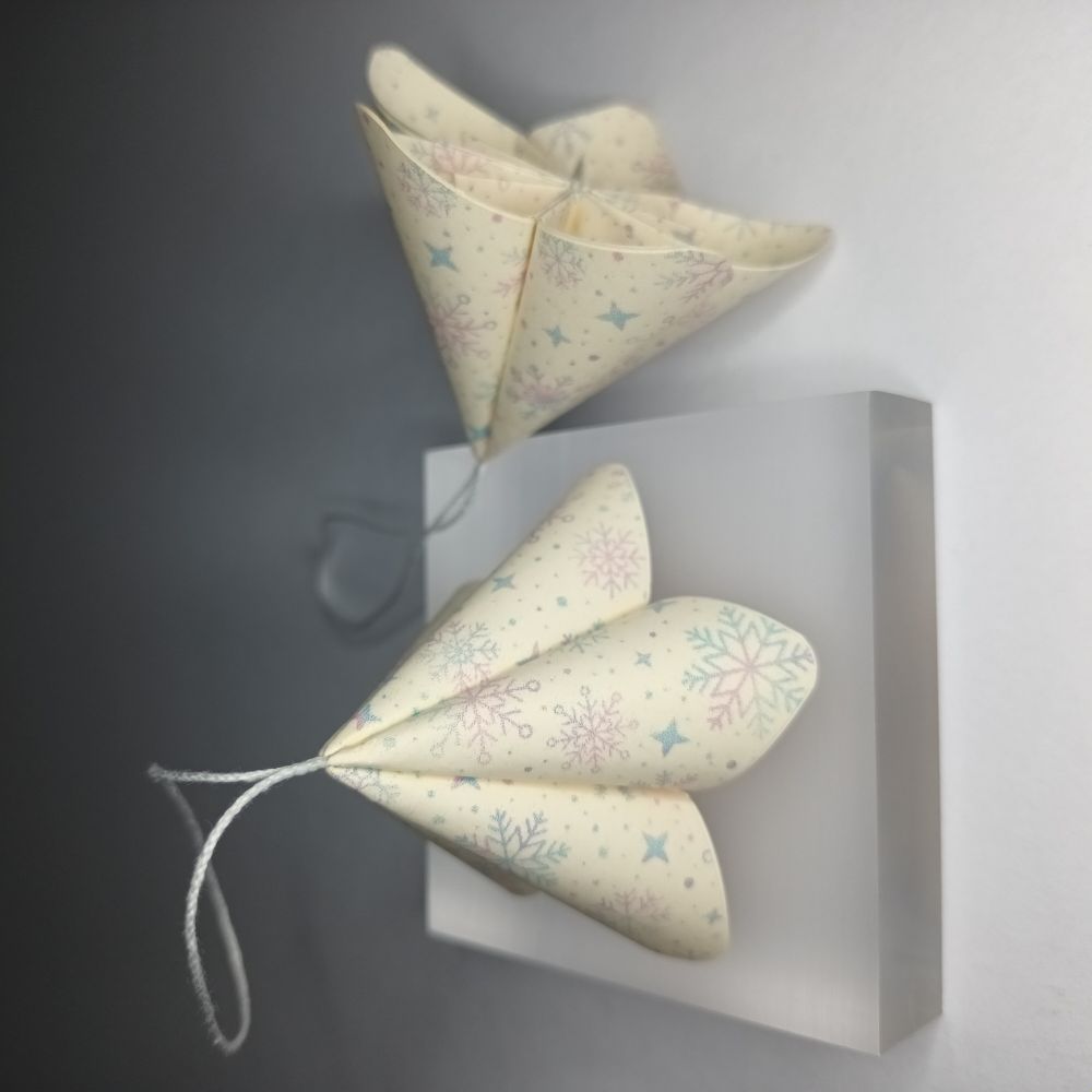 Motivpapier Schneeflocken und Sterne