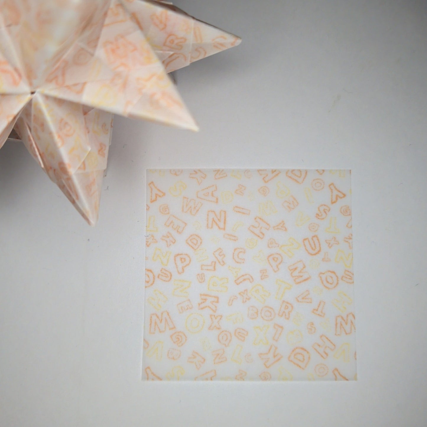 Transparentpapier Buchstaben